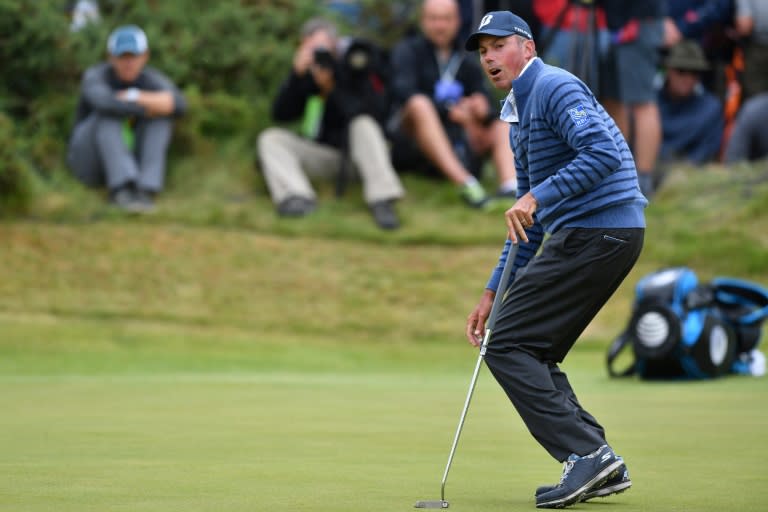 US golfer Matt Kuchar misses a putt on the 13th green on July 23, 2017