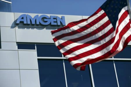 FILE PHOTO - An Amgen sign is seen at the company's office in South San Francisco, California, U.S. on October 21, 2013.  REUTERS/Robert Galbraith/File Photo