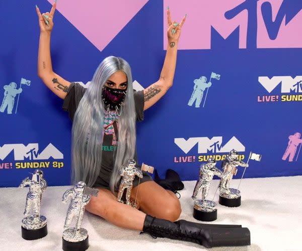 <p>We're getting major 2012 throwback vibes from Gaga's platform boots and MTV t-shirt. </p>