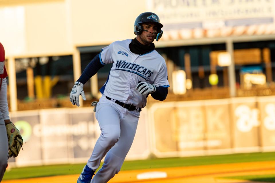 Whitecaps outfielder Roberto Campos runs the bases during the team's home opener Thursday, April 6, 2023, at LMCU Ballpark. 