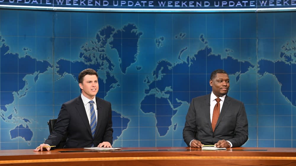  Colin Jost and Michael Che doing Weekend Update on Saturday Night Live 