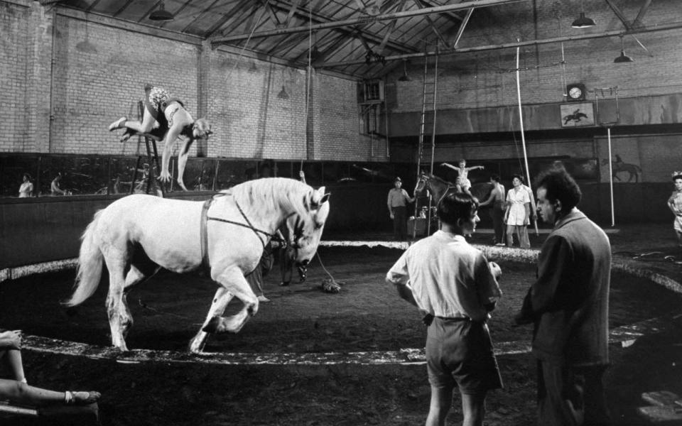 <p>The Christiani family is pictured practicing their bareback riding act for Ringling Bros. circus performance in Madison Square Garden in 1941.</p>