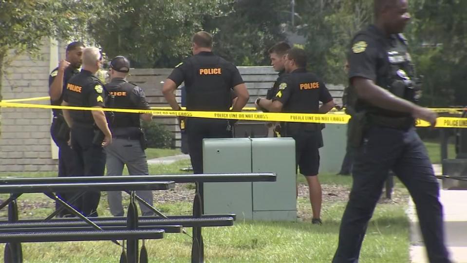 There is a large police presence at an apartment complex on Mercy Drive in Orlando on Friday afternoon.