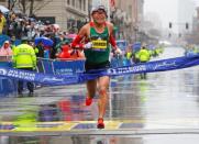 Yuki Kawauchi of Japan crosses the finish line to win the men's division of the 122nd Boston Marathon in Boston, Massachusetts, U.S., April 16, 2018. REUTERS/Brian Snyder