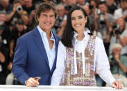 <p>Tom Cruise and Jennifer Connelly smile for the cameras on May 17 at the <em>Top Gun: Maverick </em>photo call at the Cannes Film Festival in France.</p>