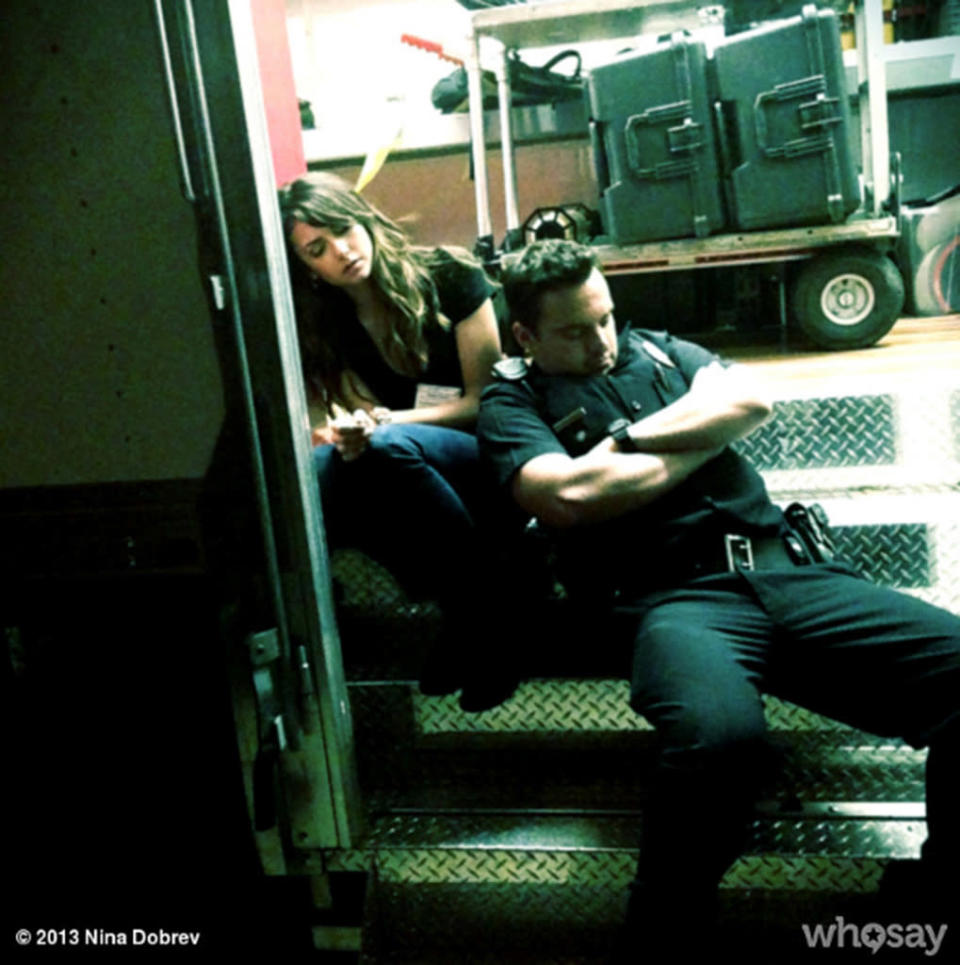 Ever wonder what actresses do in between scenes? Well, if you're Nina Dobrev on the set of her new movie, "Let's Be Cops," you take a snooze with "New Girl" star Jake Johnson! The 24-year-old actress posted this pic to her <a href="http://www.whosay.com/ninadobrev/photos/355086" rel="nofollow noopener" target="_blank" data-ylk="slk:WhoSay page;elm:context_link;itc:0;sec:content-canvas" class="link ">WhoSay page</a> over the weekend, writing, "Neeeed sleeeeeep. At this point.. We'll settle for any surface @mrjakejohnson #letsbecops #nightshooting #sunPLScomeup so we can go home."