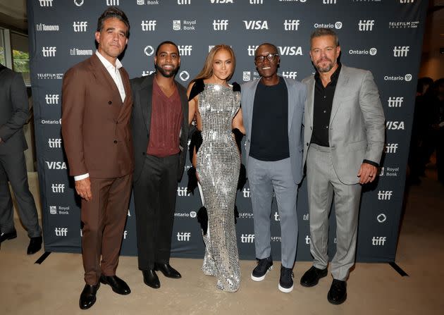 Jennifer Lopez, center, and Matt Damon, far right, pose with cast members from the film 