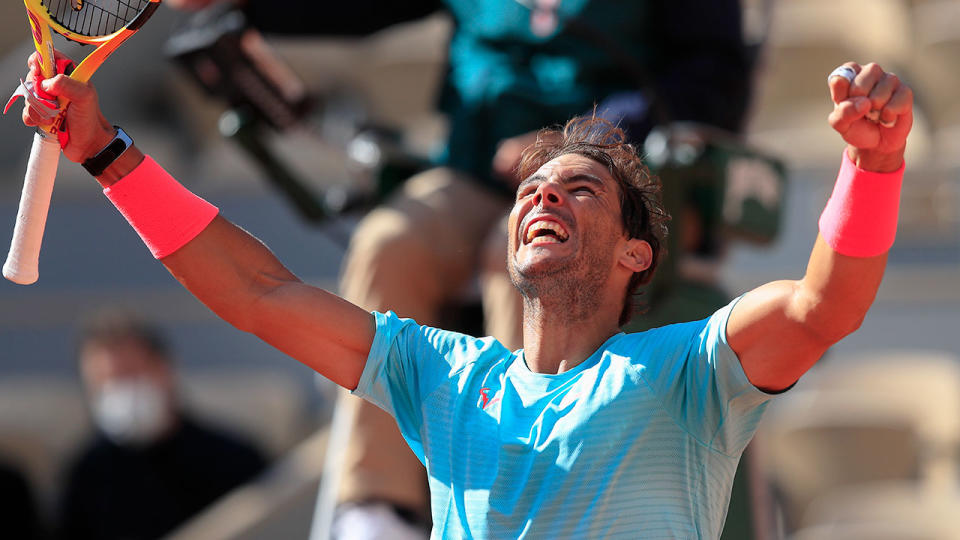 Rafael Nadal can be seen celebrating a victory at the 2020 French Open.