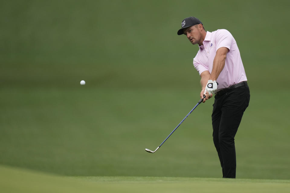 Bryson DeChambeau chips to the green on the sixth hole during the second round of the Masters golf tournament at Augusta National Golf Club on Friday, April 7, 2023, in Augusta, Ga. (AP Photo/Jae C. Hong)