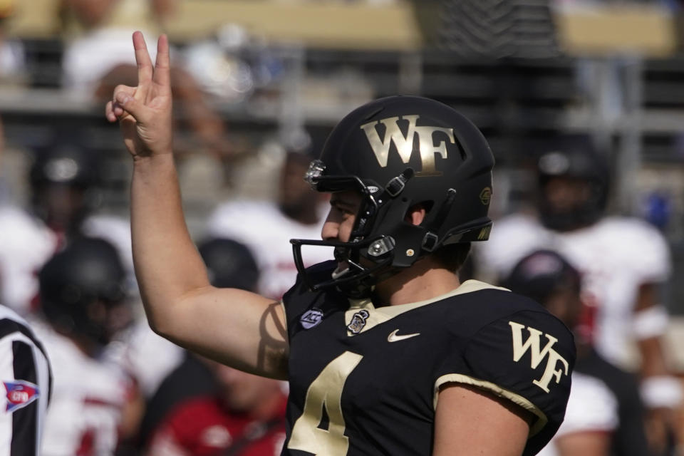 Wake Forest place kicker Nick Sciba celebrates after kicking the game winning field goal against Louisville during the second half of an NCAA college football game on Saturday, Oct. 2, 2021, in Winston-Salem, N.C. (AP Photo/Chris Carlson)