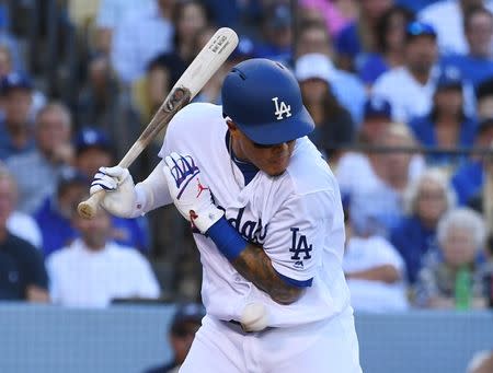 Dodgers hold on for close victory over Brewers as Manny Machado debuts in  blue – Orange County Register