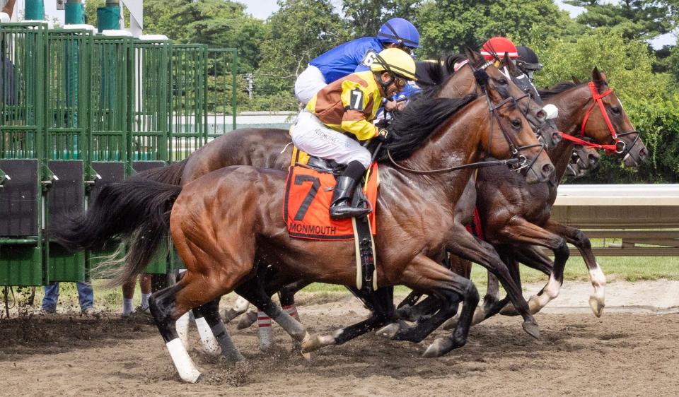 Horses break out of the gate during the Monmouth Cup, ran as part of 2023 Haskell Stakes Day at Monmouth Park in Oceanport on July 22, 2023. Credit: Peter Ackerman/Asbury Park Press