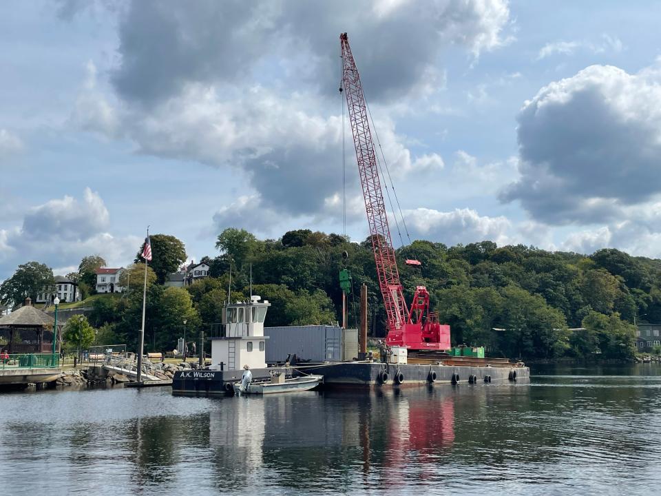 A crane at Howard Brown Park, installing ADA-compliant docks.