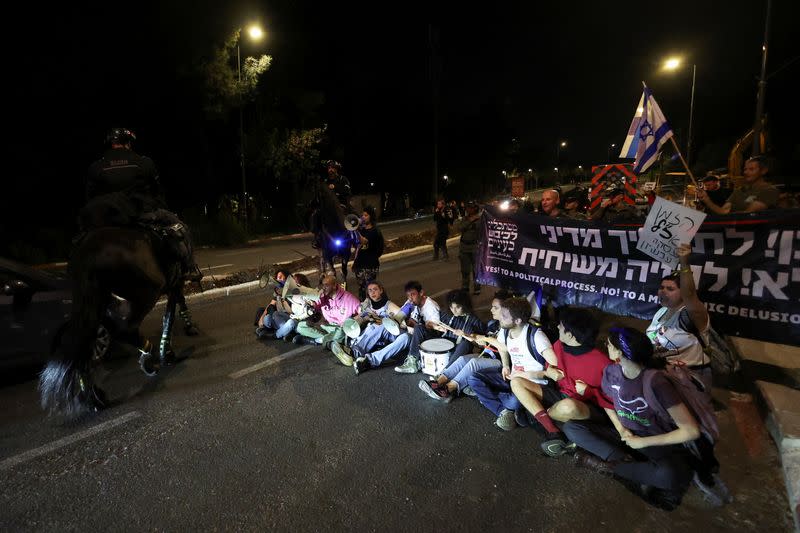 Protesters demand Israeli Prime Minister Benjamin Netanyahu's ouster, in Jerusalem