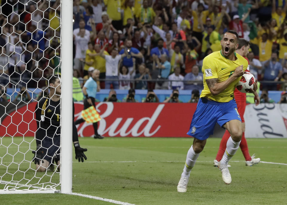 <p>Renat Augusto celebrates after he put Brazil back into the match at 2-1 </p>