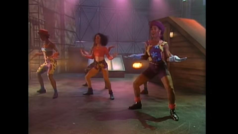 Fly Girls three women in '90s clothes dancing 
