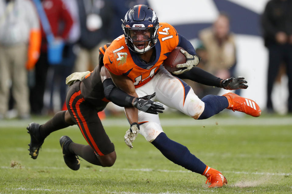 Denver Broncos wide receiver Courtland Sutton (14) is hit by Cleveland Browns cornerback Denzel Ward during the second half of NFL football game Sunday, Nov. 3, 2019, in Denver. (AP Photo/David Zalubowski)