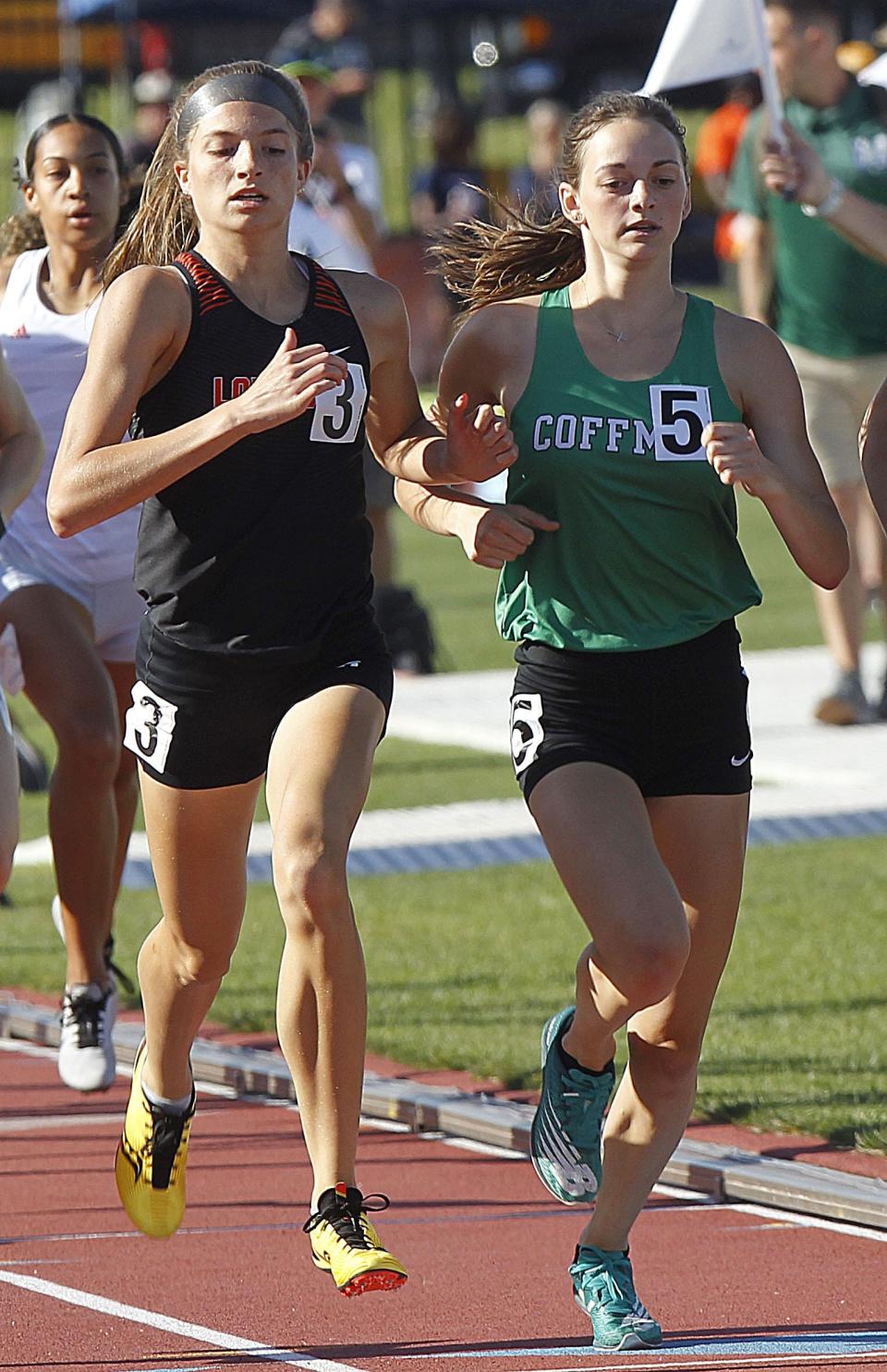 Coffman's Kylie Feeney runs against Loveland's Madison Conatser in the 800 meters at the Division I state meet. Feeney placed fifth.