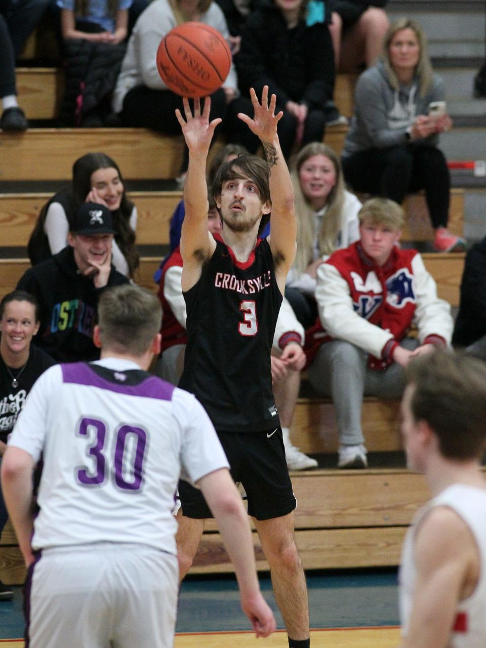 Crooksville senior Ryan Moore shoots a 3-pointer during the Licking-Muskingum All-Star Game Sunday at Licking Valley High School.