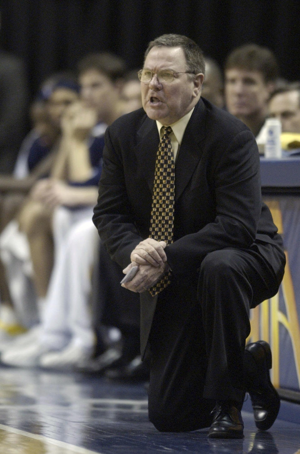 FILE - Indiana Pacers assistant coach Brendan Malone gives instructions to the team during the first quarter of an NBA basketball game against the Boston Celtics in Indianapolis, Saturday, Feb. 1, 2003. Malone, father of Nuggets coach Michael Malone and a driving force behind the Detroit Pistons “Bad Boy” defenses in the late 1980s and early '90s, has died, the Nuggets announced Tuesday, Oct. 10, 2023. He was 81. (AP Photo/Darron Cummings, File)