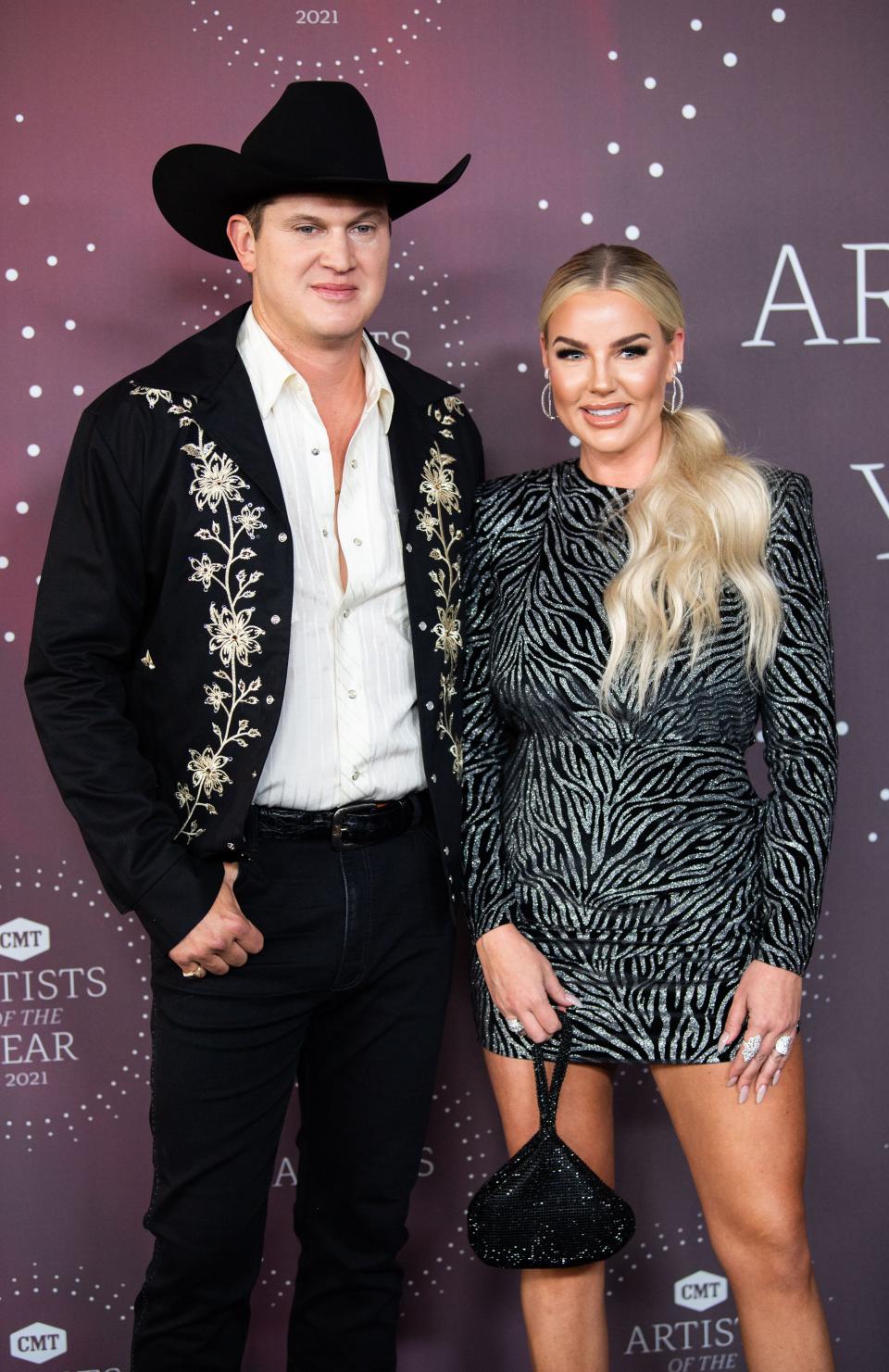 Jon Pardi and his wife Summer Duncan pose together during the CMT Red Carpet event at Schermerhorn Symphony Center in Nashville, Tenn., Wednesday, Oct. 13, 2021. 