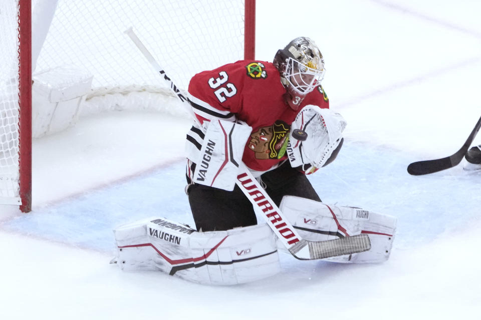 Chicago Blackhawks goaltender Alex Stalock makes a chest-save during the second period of an NHL hockey game against the Ottawa Senators, Monday, March 6, 2023, in Chicago. (AP Photo/Charles Rex Arbogast)