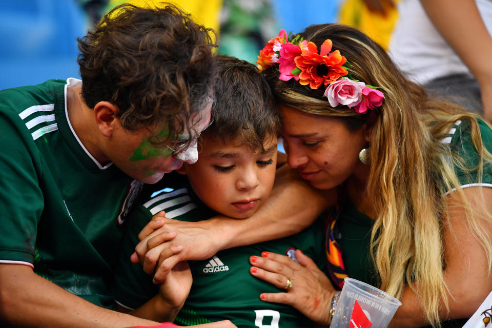 <p>Mexico fans look dejected after the match REUTERS/Dylan Martinez </p>