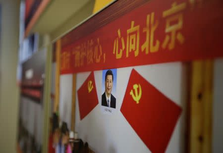 A picture shows Chinese President Xi Jinping's portrait during an exhibition displaying China's achievements for the past five years, as a part of the celebrations of the upcoming 19th National Congress of the Communist Party of China (CPC) at Beijing Exhibition Centre in Beijing, China October 10, 2017. Picture taken October 10, 2017. REUTERS/Jason Lee