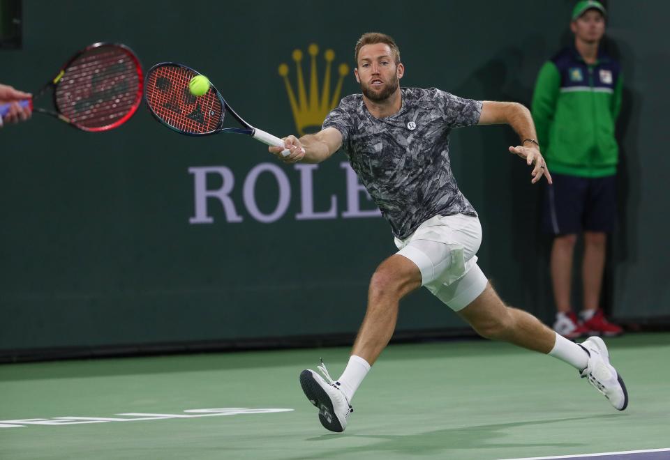 Jack Sock and John Isner play doubles against Simone Bolelli and Fabio Fognini during the BNP Paribas Open in Indian Wells, Calif., March 15, 2023.
