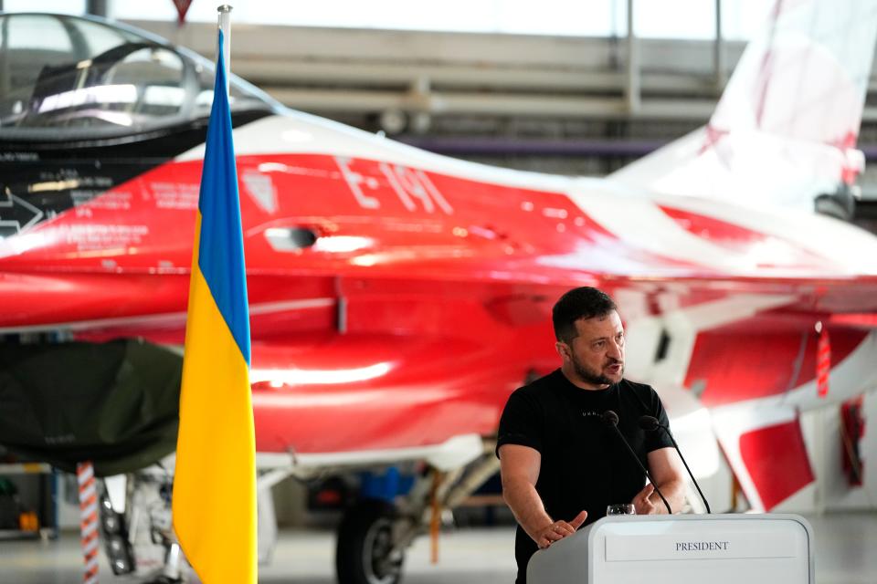 Ukrainian President Volodymyr Zelenskyy speaks as he and Denmark's Prime Minister Mette Frederiksen hold a press conference, at Skrydstrup Airbase, in Vojens, Denmark, on Aug. 20, 2023.