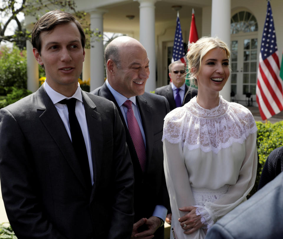 FILE PHOTO - Trump Senior Advisor Jared Kushner (L), his wife Ivanka Trump and with chief economic advisor Gary Cohn depart a news conference by U.S. President Donald Trump and King Abdullah of Jordan at the White House in Washington, U.S., April 5, 2017. REUTERS/Kevin Lamarque/File Photo