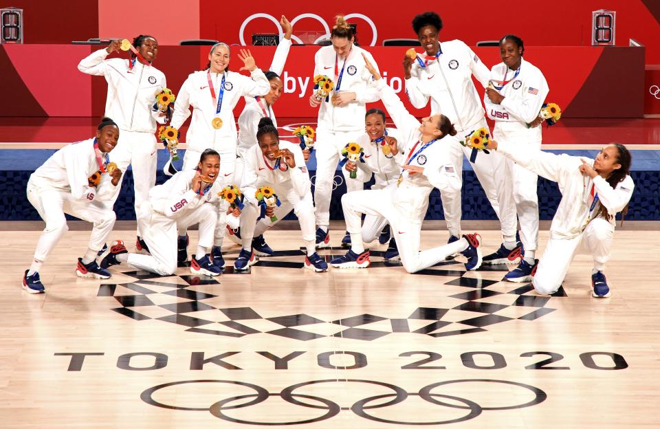 Team United States celebrates its gold medals during the Women's Basketball medal ceremony at the 2020 Tokyo Olympic games in Saitama, Japan.