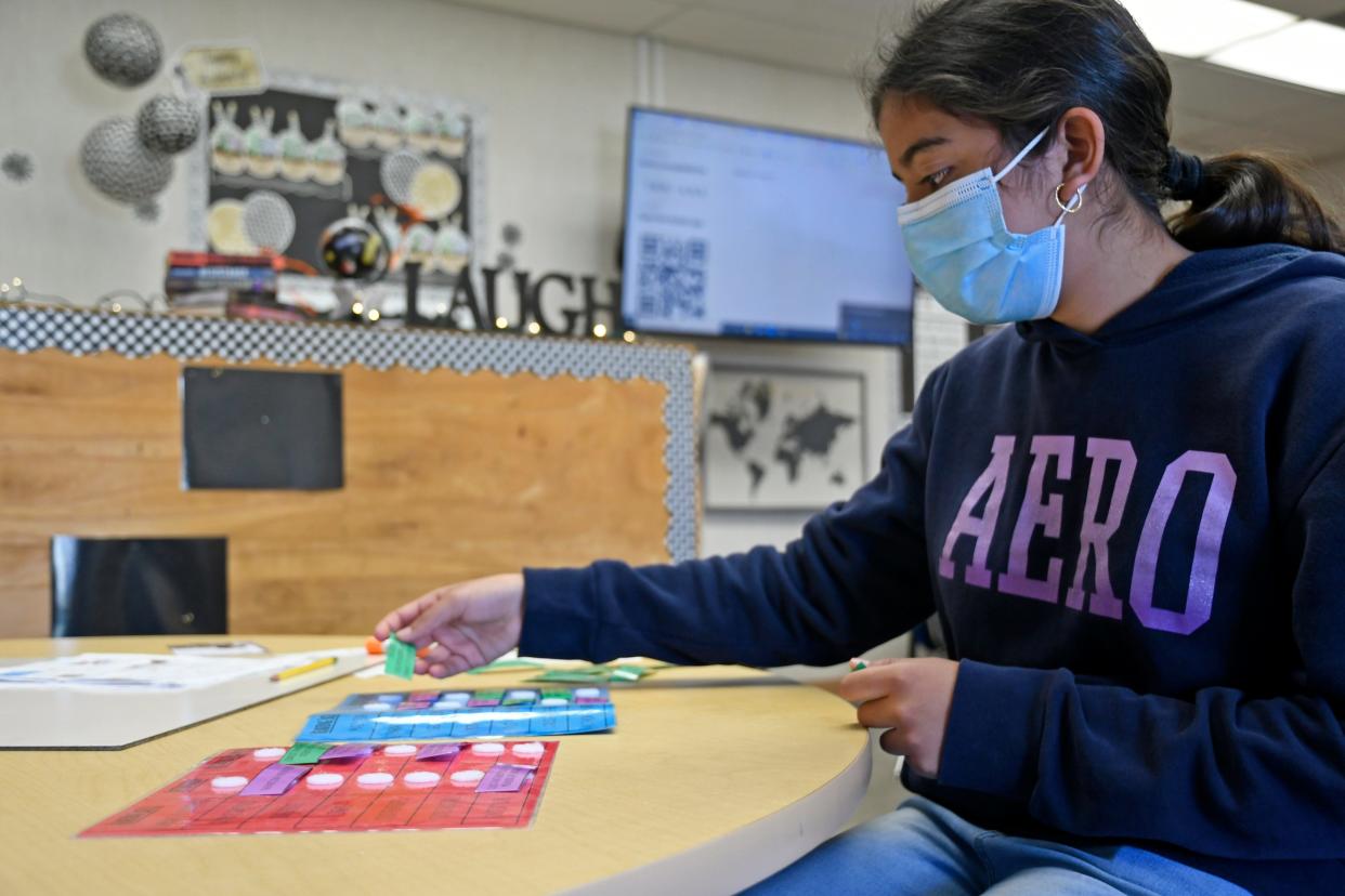 Daisy Guzman, student at  Global Learning Charter School, works on an assignment during class on Friday, Oct. 15, 2021.