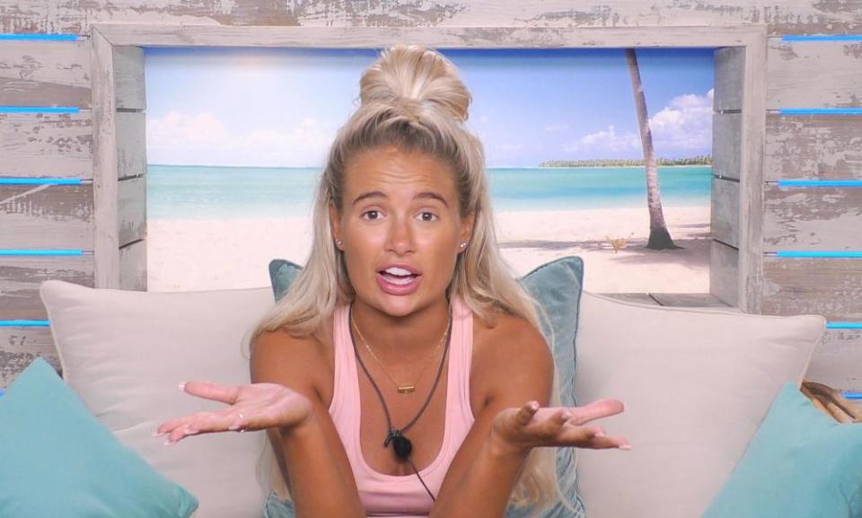 Molly-Mae Hague before a tropical backdrop in Love Island