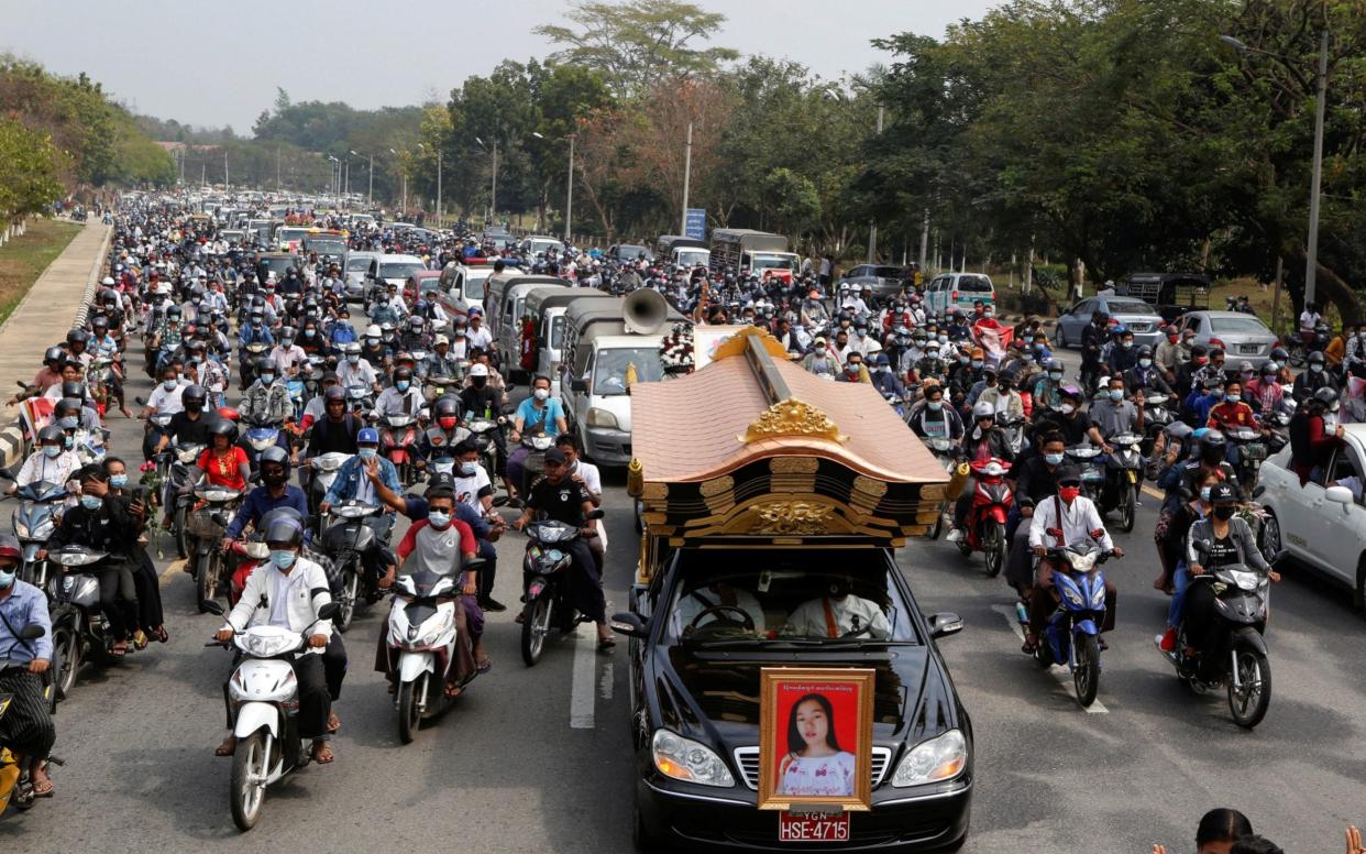 Hundreds attend the funeral of Mya Thwate Khaing, a young woman who died after being shot in the head at a protest - Reuters
