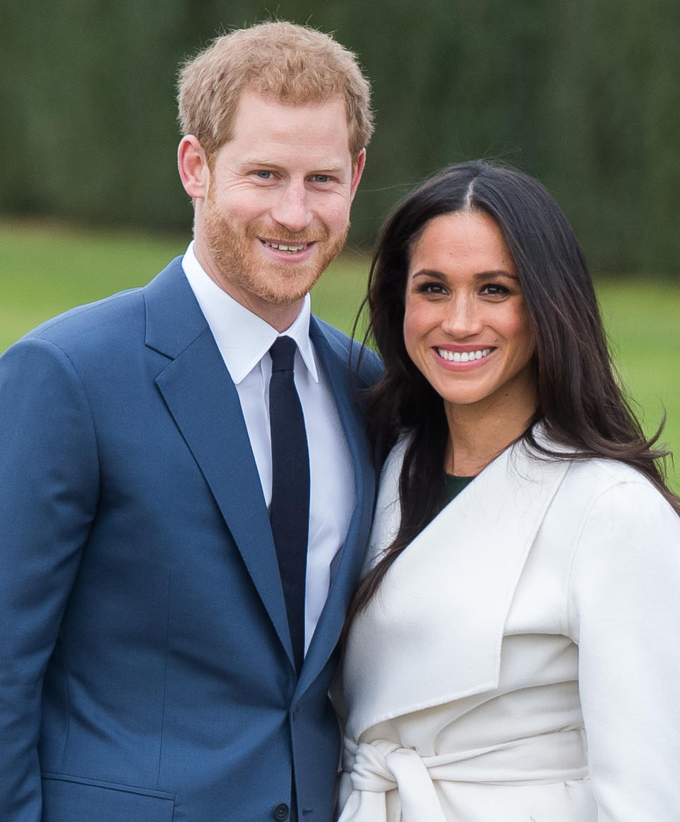 Prince Harry and Meghan Markle during an official photocall to announce their engagement on Nov. 27, 2017. (Photo by Samir Hussein/Samir Hussein/WireImage)