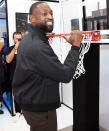 <p>Dwyane Wade attends the opening night of his pop-up exhibit in Miami on Nov. 19.</p>