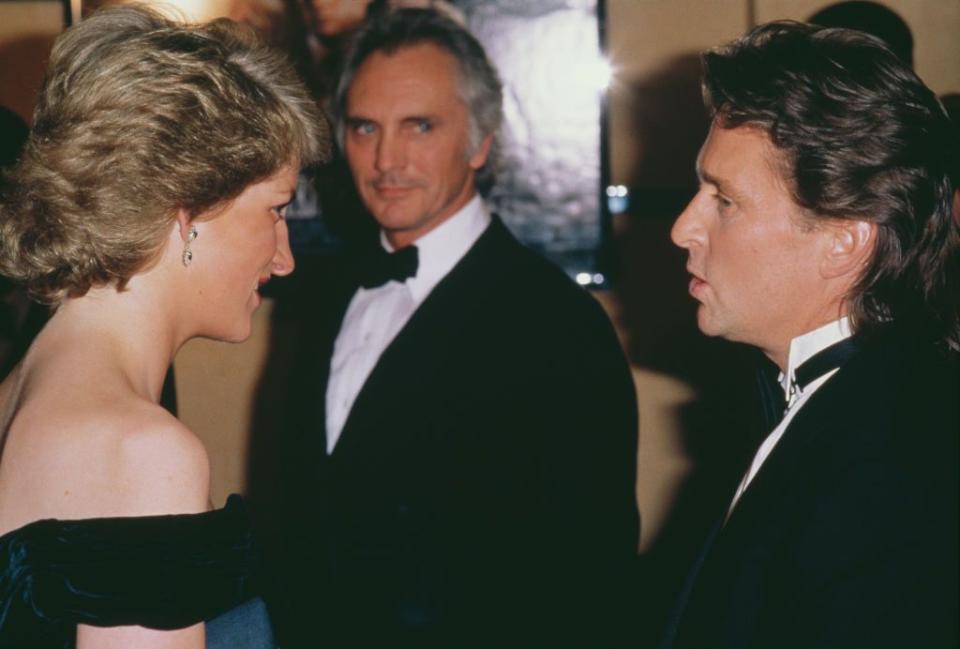 <p>In true '80s fashion, Michael Douglas rocked a mullet with his formal tuxedo. The American actor met the Princess while attending the London premiere of his hit movie, <em>Wall Street</em><em>. </em></p>