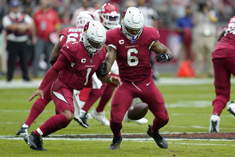 Arizona Cardinals running back James Conner (6) and quarterback Kyler Murray (1) attempt to recover a botched snap during the first half of an NFL football game against the Kansas City Chiefs, Sunday, Sept. 11, 2022, in Glendale, Ariz. (AP Photo/Ross D. Franklin)