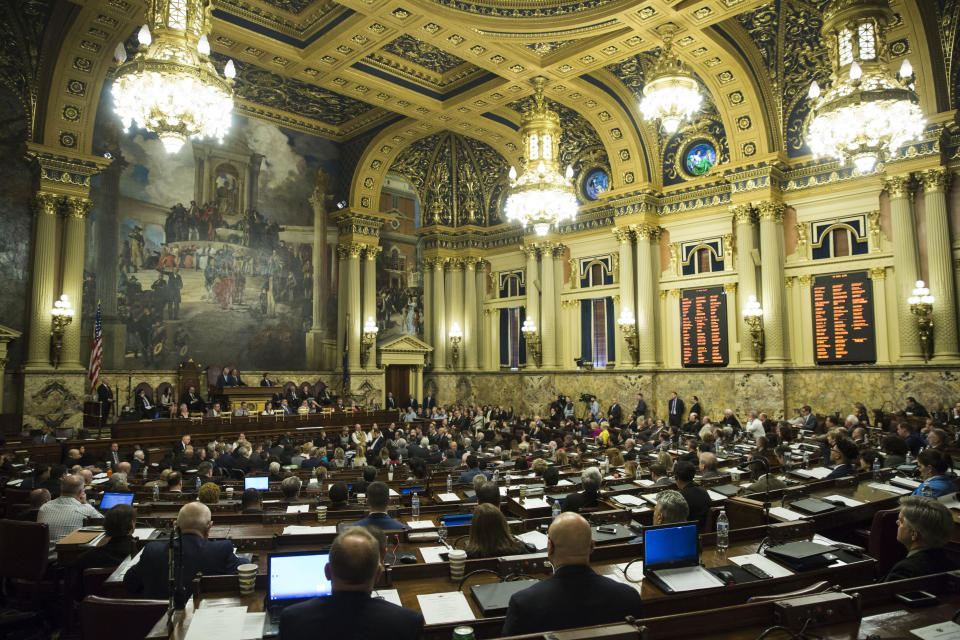 Pennsylvania lawmakers gather in an unusual joint session to commemorate the victims of the Pittsburgh synagogue attack that killed 11 people last year, Wednesday, April 10, 2019, at the state Capitol in Harrisburg, Pa. (AP Photo/Matt Rourke)