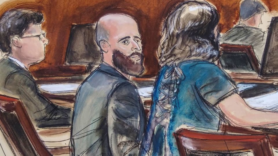 In this courtroom sketch, Joshua Schulte, center, sits at the defense table flanked by his attorneys during jury deliberations, March 4, 2020, in New York.  -Elizabeth Williams/AP