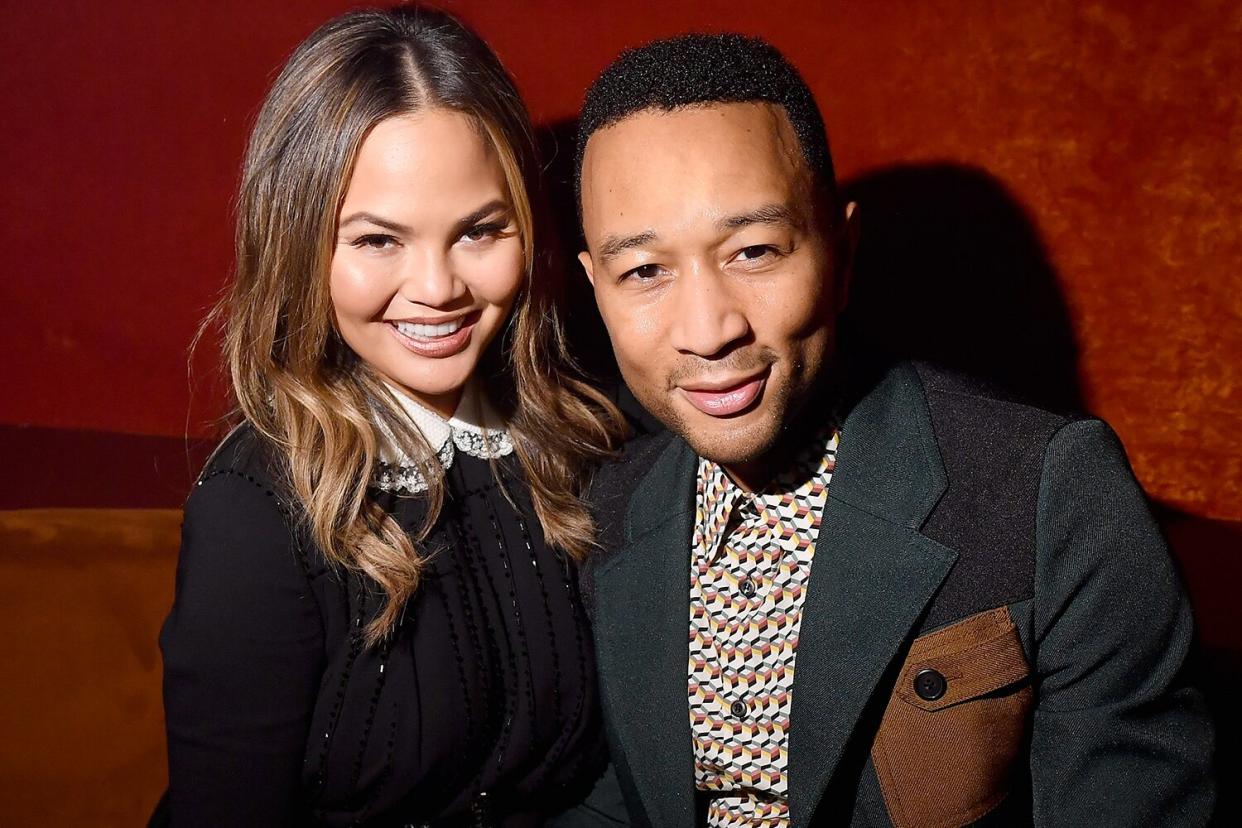 PARIS, FRANCE - OCTOBER 03: Chrissy Teigen and John Legend attends the Miu Miu aftershow party as part of the Paris Fashion Week Womenswear Spring/Summer 2018 at Boum Boum on October 3, 2017 in Paris, France. (Photo by Victor Boyko/Getty Images)