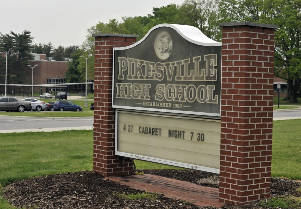 This undated photo shows the Pikesville High School sign on the school property. (Lloyd Fox/The Baltimore Sun via AP)