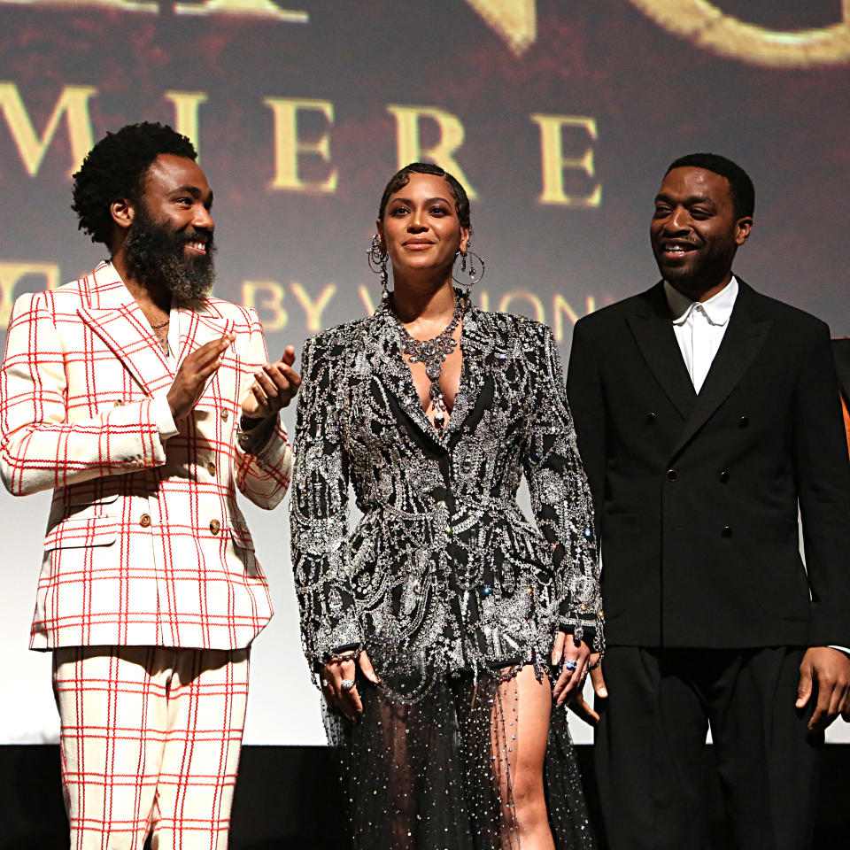 HOLLYWOOD, CALIFORNIA - JULY 09: (EDITORS NOTE: Retransmission with alternate crop.) (L-R) Donald Glover, Beyonce Knowles-Carter, and Chiwetel Ejiofor attend the World Premiere of Disney's &quot;THE LION KING&quot; at the Dolby Theatre on July 09, 2019 in Hollywood, California. (Photo by Jesse Grant/Getty Images for Disney)