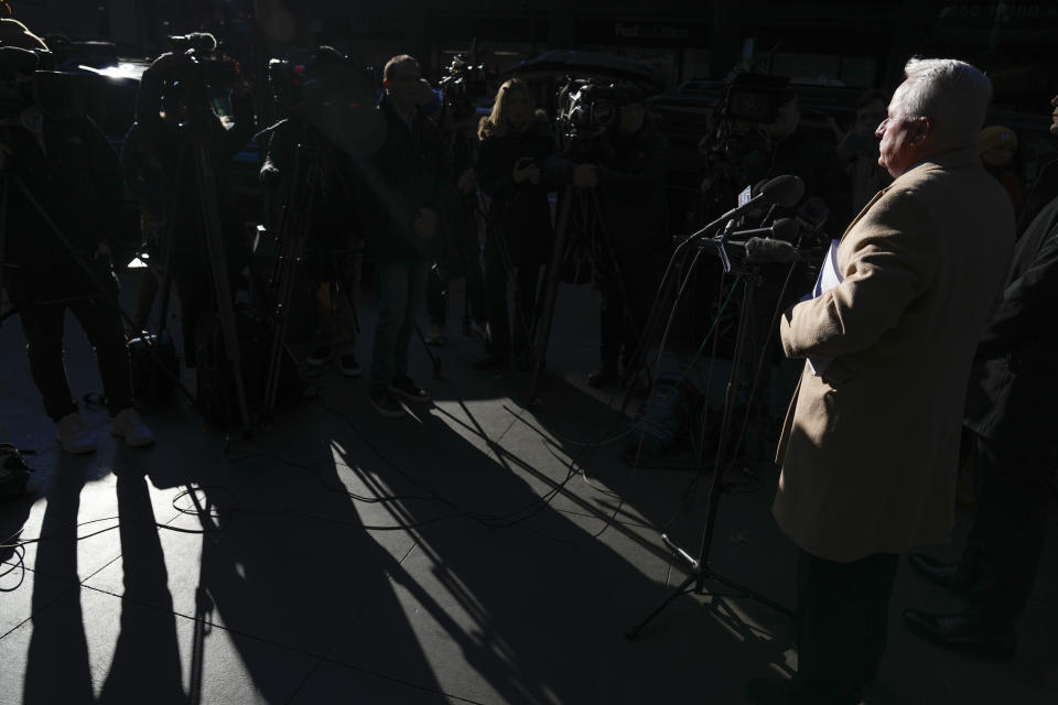 Attorney Bob Costello, right, talks to reporters after testifying before a grand jury investigating Donald Trump in New York, Monday, March 20, 2023. (AP Photo/Seth Wenig)