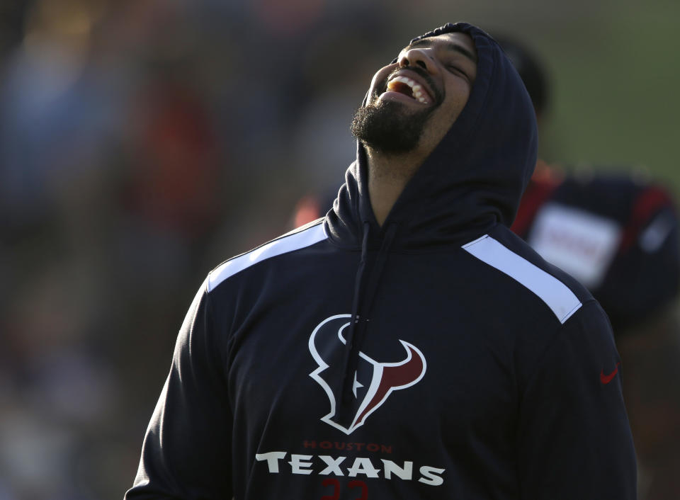 Houston Texans running back Arian Foster laughs during NFL football training camp Monday, July 28, 2014, in Houston. (AP Photo/Pat Sullivan)