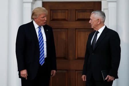 U.S. President-elect Donald Trump stands with retired Marine Gen. James Mattis following their meeting at the main clubhouse at Trump National Golf Club in Bedminster, New Jersey, U.S., November 19, 2016. REUTERS/Mike Segar