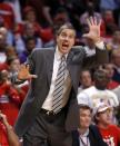 Washington Wizards head coach Randy Wittman directs his team during the second half of Game 2 in an opening-round NBA basketball playoff series against the Chicago Bulls Tuesday, April 22, 2014, in Chicago. The Wizards won 101-99. (AP Photo/Charles Rex Arbogast)