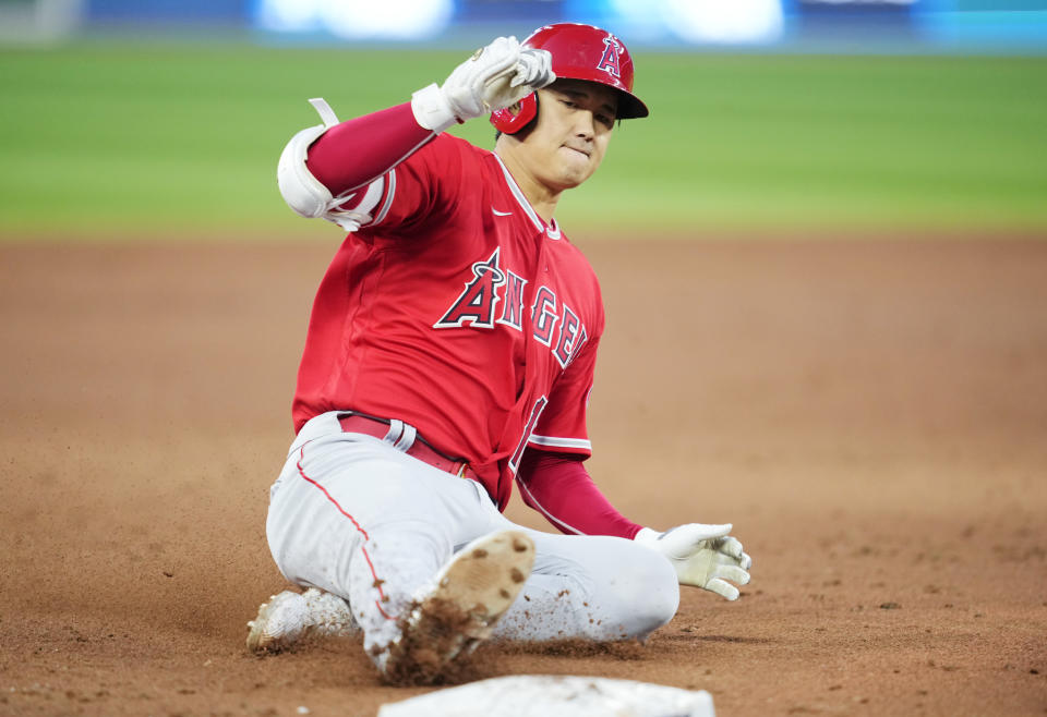 TORONTO, ON - AUGUST 26: Shohei Ohtani #17 of the Los Angeles Angels slides into third base with an RBI triple against the Toronto Blue Jays in the second inning during their MLB game at the Rogers Centre on August 26, 2022 in Toronto, Ontario, Canada. (Photo by Mark Blinch/Getty Images)