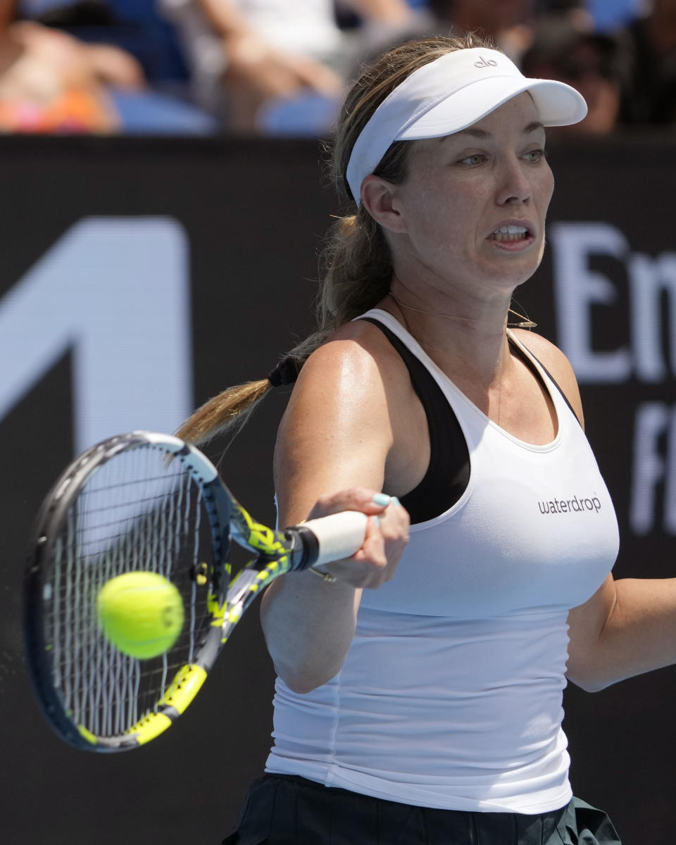 Danielle Collins of the U.S. plays a forehand return to Anna Kalinskaya of Russia during their first round match at the Australian Open tennis championship in Melbourne, Australia, Monday, Jan. 16, 2023. (AP Photo/Dita Alangkara)